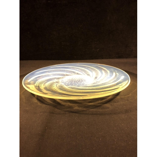 34 - Lalique - Poisson, an opalescent glass plate, decorated with curved fish radiating from a central bo... 