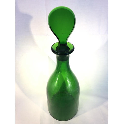 217 - English Glass - an emerald green glass mallet form decanter with flat teardrop stopper, 33cm high (2... 