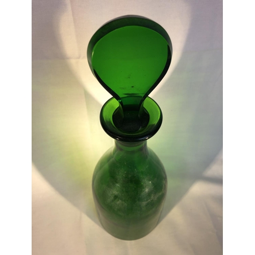 217 - English Glass - an emerald green glass mallet form decanter with flat teardrop stopper, 33cm high (2... 