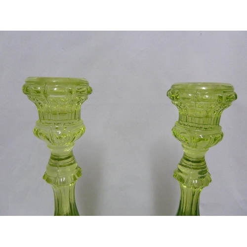 216 - Clayton Mayers - a pair of pressed glass Jacobean pattern cruet bottles and stoppers, 22.5cm high; a... 