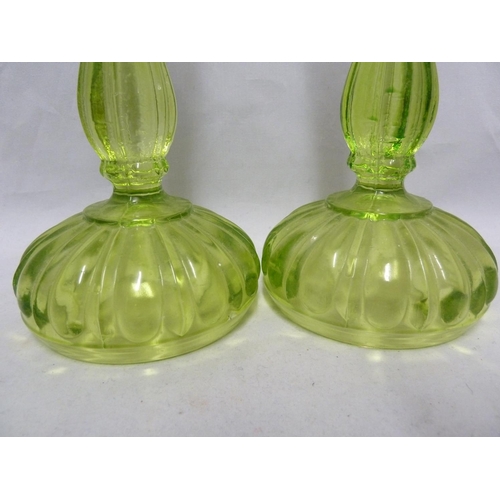 216 - Clayton Mayers - a pair of pressed glass Jacobean pattern cruet bottles and stoppers, 22.5cm high; a... 