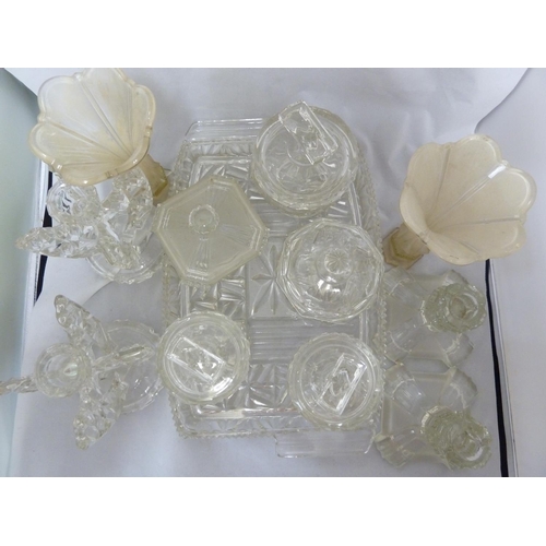 215 - English pressed glass - quantity of pressed glass dressing table wares, including a pair of Art Deco... 