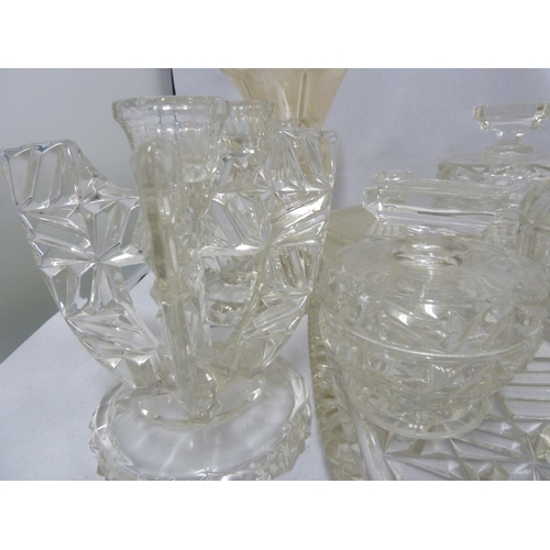 215 - English pressed glass - quantity of pressed glass dressing table wares, including a pair of Art Deco... 