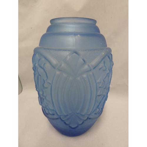 172 - Continental Glass - an Art Deco frosted glass vase, of cornflower blue colour, moulded with floral s... 