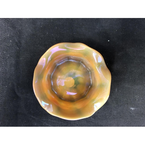 185 - Cristallerie de Pantin - an iridescent opaline glass salt, pink/orange colouration, circular with wa... 