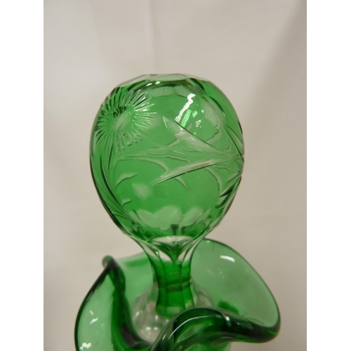 245 - Stevens and Williams - a glass Whisky decanter and stopper, the green casing cut through to clear wi... 