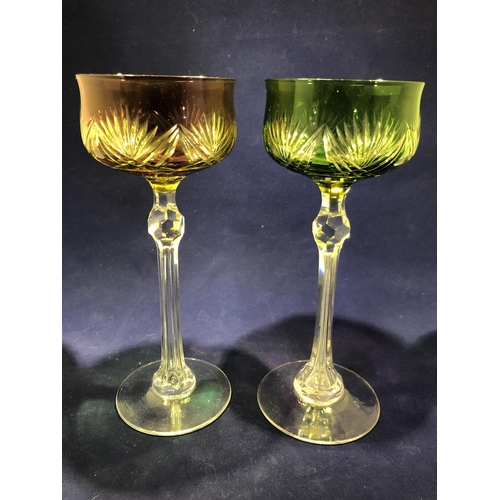 115 - Continental Glass - Two two colour overlay hock glasses, the bowls of green; and amethyst over yello... 