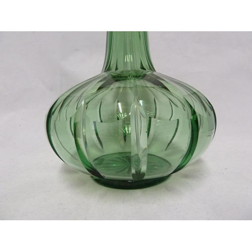 214 - English Glass - possibly Richardsons, a large emerald green glass decanter, the lobed and fluted bod... 