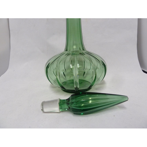 214 - English Glass - possibly Richardsons, a large emerald green glass decanter, the lobed and fluted bod... 