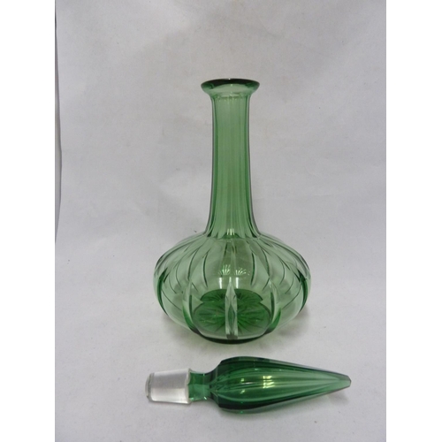 214 - English Glass - possibly Richardsons, a large emerald green glass decanter, the lobed and fluted bod... 