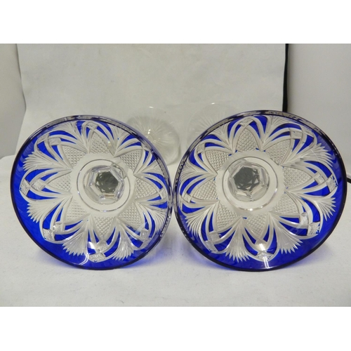 118 - Baccarat - a pair of Tzar Champagne coups, the bowls cased in cobalt blue and cut with a stylised Lo... 