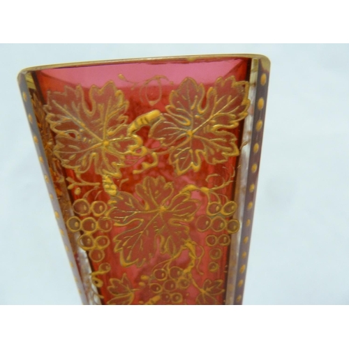 173 - Moser style- a square section glass vase of cranberry colour tapering to the frosted glass foot, the... 