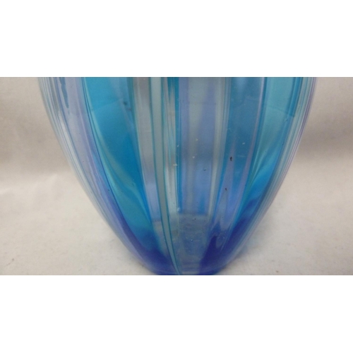 71 - Murano Glass - a fused cane baluster vase, striped in blue and white, Italy, 16.5cm high