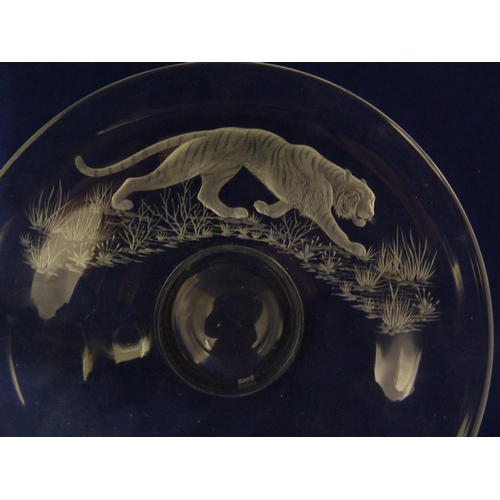 42 - Michael Fairbairn - Tiger, a colourless glass low pedestal bowl, engraved with the big cat in a gras... 