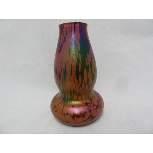 146 - Kralik - a double gourd form glass vase of variegated violet and rose with green iridescence, 18.5cm... 