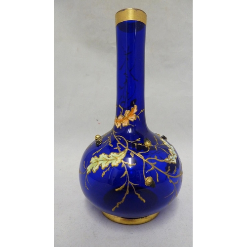 176 - Moser - a cobalt blue bottle vase, enamelled and gilded with oak leaves and branches with applied si... 