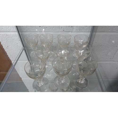 219 - English Glass - a part suite of 'Hops & Barley' pattern wine glasses, engraved on a Georgian Rummer ... 