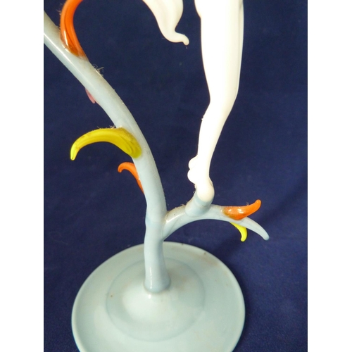 85 - Bimini - a lampwork glass figure of Spring, she of white glass posed arched backwards with arms upra... 