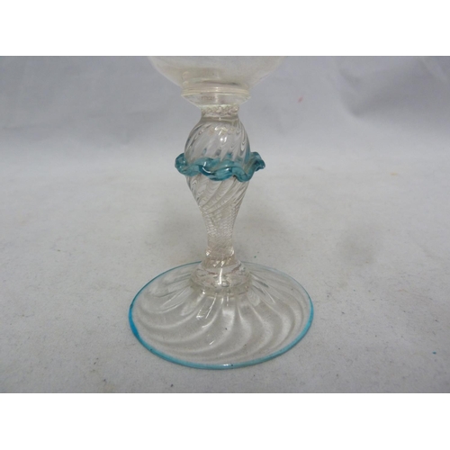 65 - Salviati - a wrythen twist wine glass, on baluster stem, the rim and foot trailed in turquoise, the ... 