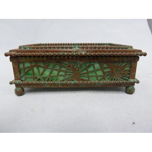 161 - Tiffany Studios, New York - a glass and patinated bronze 'pine needle box, rectangular set with pane... 