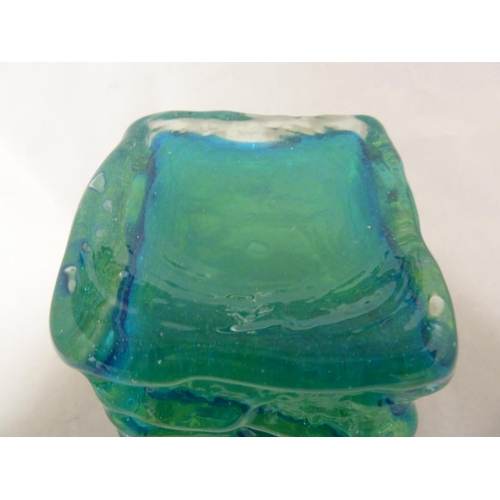 19 - Mdina glass - a Bark vase, of small size, of square section base and circular top, blue/green colour... 