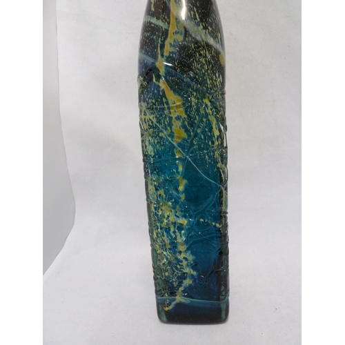 22 - Mdina glass - a large attenuated bottle with random strapping, of amethyst, blue and sand colouratio... 