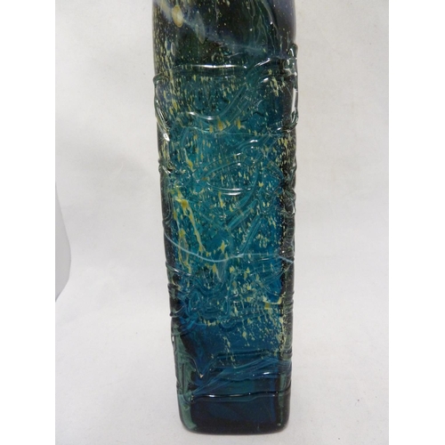 22 - Mdina glass - a large attenuated bottle with random strapping, of amethyst, blue and sand colouratio... 