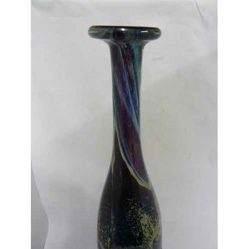 22 - Mdina glass - a large attenuated bottle with random strapping, of amethyst, blue and sand colouratio... 