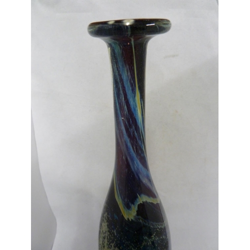 22 - Mdina glass - a large attenuated bottle with random strapping, of amethyst, blue and sand colouratio... 