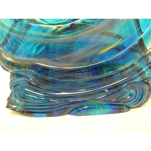 23 - Mdina glass - a knot sculpture, in predominantly blue colour, marked to base Mdina Glass, dated 1975... 