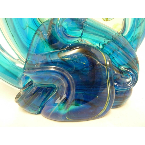 23 - Mdina glass - a knot sculpture, in predominantly blue colour, marked to base Mdina Glass, dated 1975... 