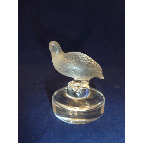 109 - Lalique - a Perdrix / Partridge bird glass paperweight the frosted glass bird standing a top a colou... 