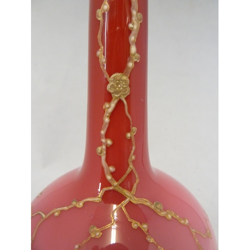 169 - Harrach - a peach blow glass vase of bottle form, the ground graduated from deep rose pink to pale p... 