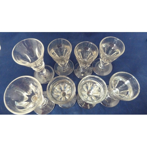 210 - English glass - a set of six deceptive toasting glasses, the octagonal facetted bowl on short stem w... 