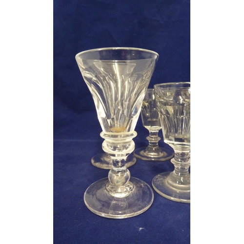 210 - English glass - a set of six deceptive toasting glasses, the octagonal facetted bowl on short stem w... 