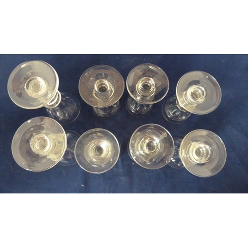 210 - English glass - a set of six deceptive toasting glasses, the octagonal facetted bowl on short stem w... 