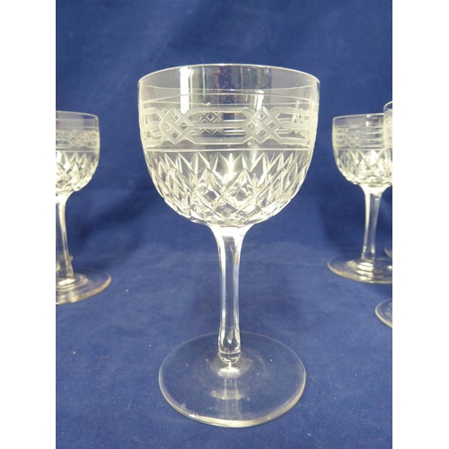 199 - English Glass - A set of 12 port wine glasses, cut and engraved with a Gothic knot border in Pugin s... 