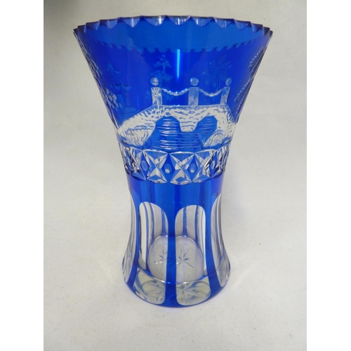 250 - Stevens & Williams - a blue cased glass vase, of waisted cylindrical form the cobalt blue cut throug... 