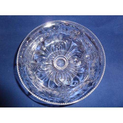 256 - Webbs - a footed tazza of colourless Rock Crystal type glass, cut with leafy swags over a stylised s... 