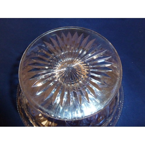 256 - Webbs - a footed tazza of colourless Rock Crystal type glass, cut with leafy swags over a stylised s... 