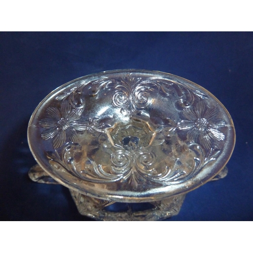 125 - French Glass - a moulded colorless glass sugar box and cover, in the Rock Crystal style, the two han... 