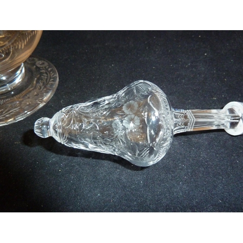 258 - Stevens & Williams - a Rock Crystal glass claret jug and stopper, the pear form body with high loope... 