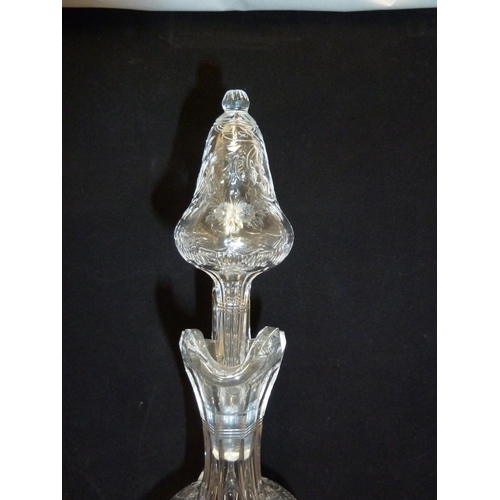 258 - Stevens & Williams - a Rock Crystal glass claret jug and stopper, the pear form body with high loope... 