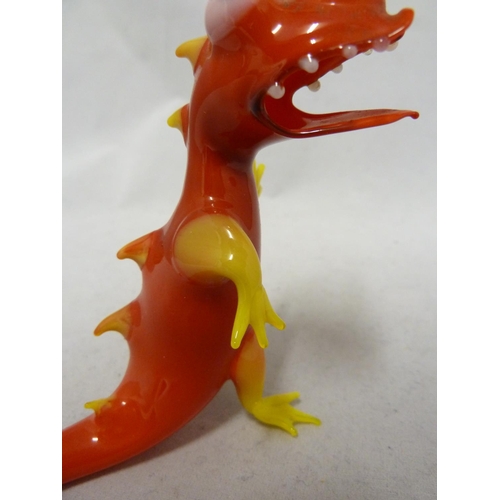 79 - Czechoslovakian Glass - a lamp blown figure of a dinosaur, brightly coloured polychrome glass, 10.5c... 