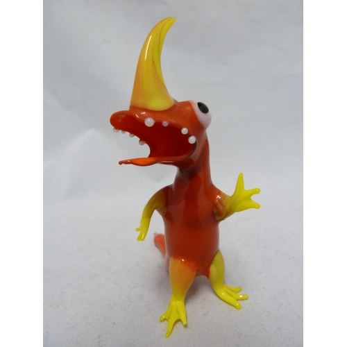 79 - Czechoslovakian Glass - a lamp blown figure of a dinosaur, brightly coloured polychrome glass, 10.5c... 