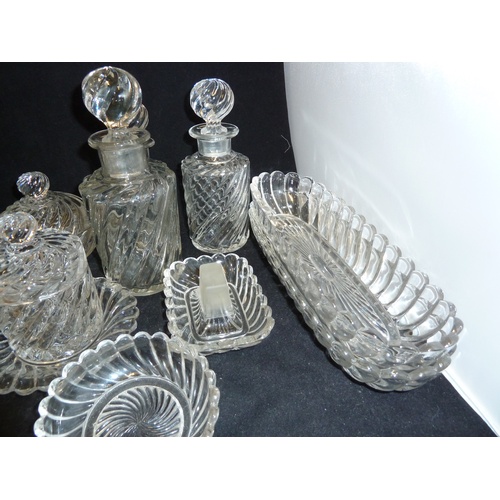 124 - A Baccarat glass dressing table service, colourless, decorated with wrythen gadrooning, comprises, t... 