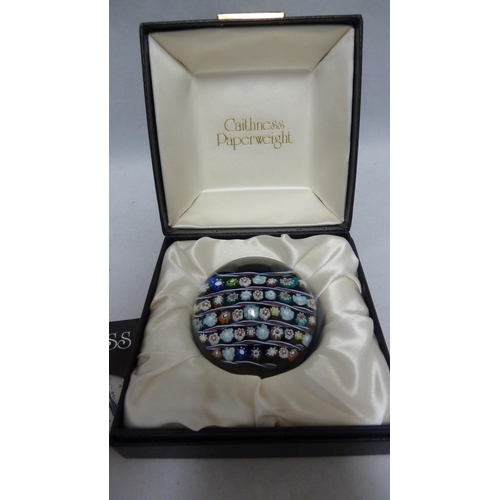 109 - Colin Terris for Caithness Glass Ltd - A Regency Stripe Limited Edition paperweight, formed of paral... 