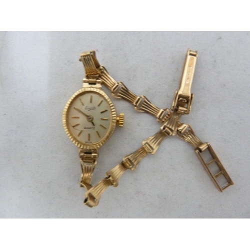 95 - A ladies 9ct gold Everite Quartz wristwatch, 7.3 grms approx