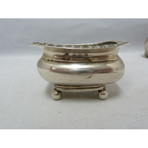 96 - Five silver cruet items, comprising a pair of salts; mustard pot and hinged cover; mustard pot; and ... 