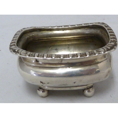 96 - Five silver cruet items, comprising a pair of salts; mustard pot and hinged cover; mustard pot; and ... 